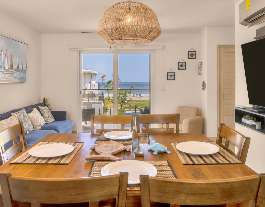 the dining table of a vacation rental with ocean views